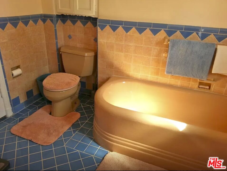 10317 Lauriston Avenue Los Angeles, CA 90025 - Photo 40 of 52 a bathroom with a toilet and a sink