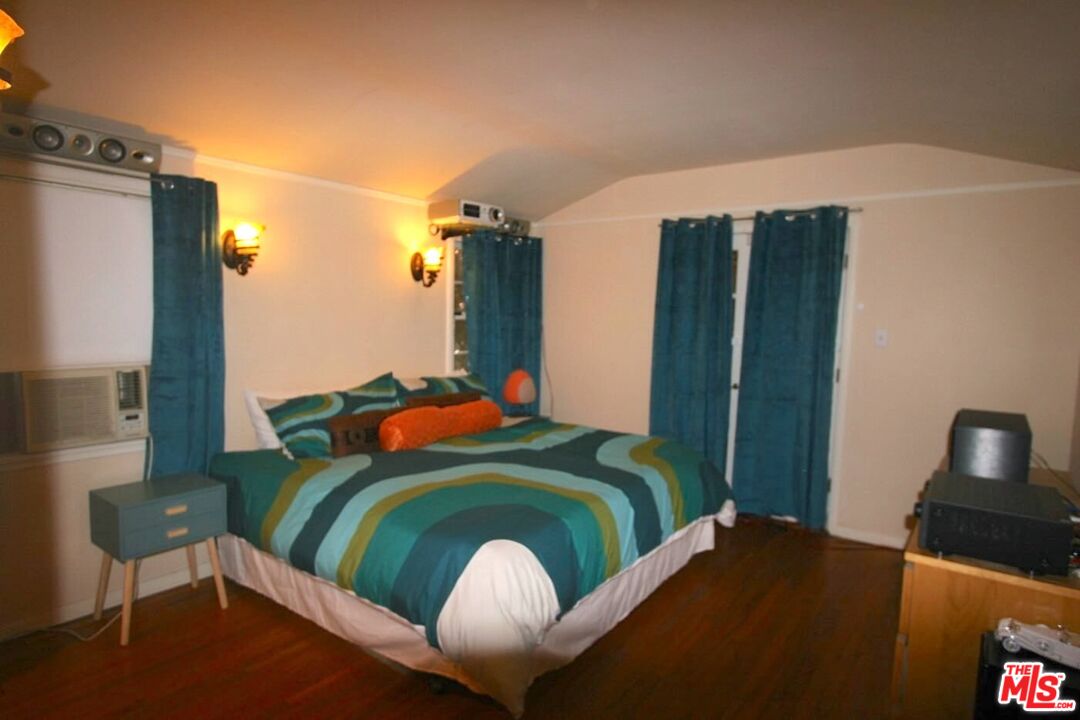 10317 Lauriston Avenue Los Angeles, CA 90025 - Photo 42 of 52 a bedroom with a bed and chair