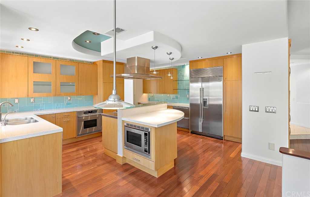 34 New Haven Laguna Niguel, CA 92677 - Photo 11 of 35 a kitchen with a stove a sink and a refrigerator