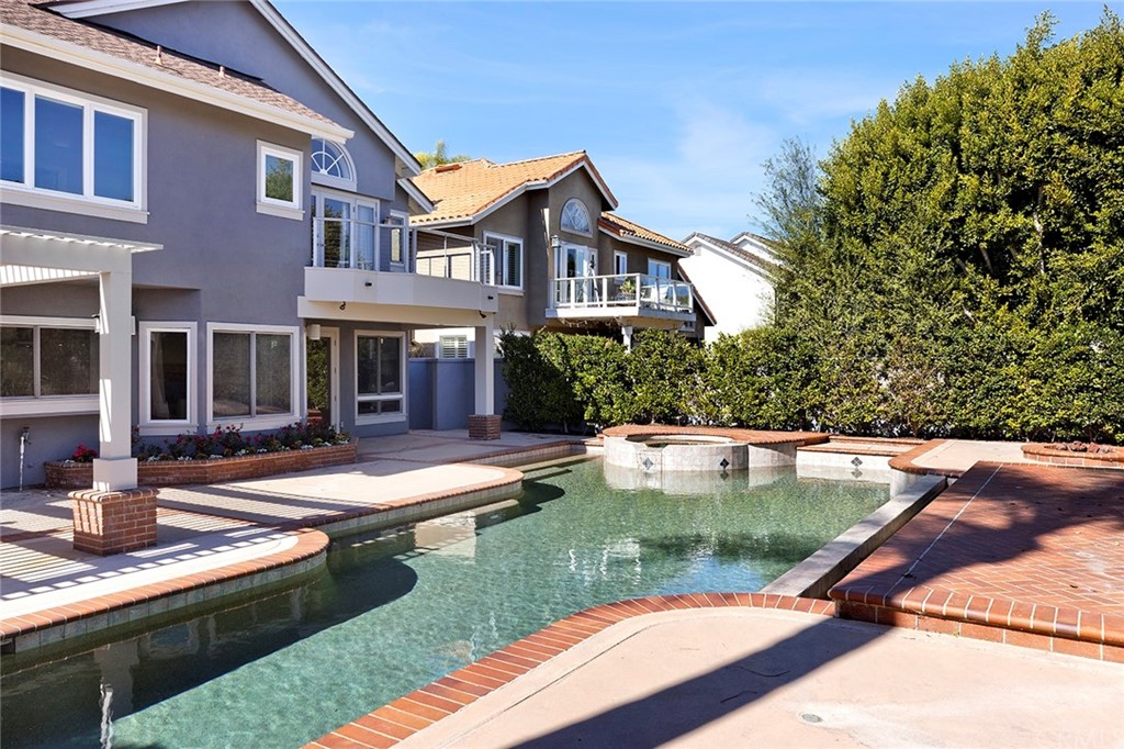 34 New Haven Laguna Niguel, CA 92677 - Photo 18 of 35 a view of a house with swimming pool and a yard