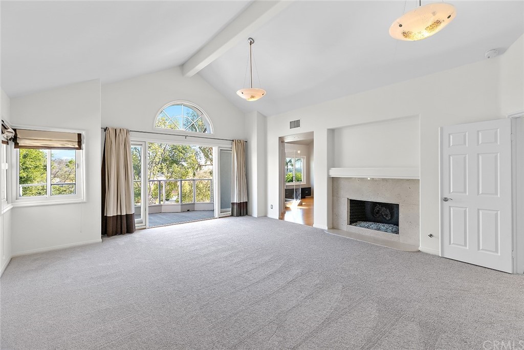 34 New Haven Laguna Niguel, CA 92677 - Photo 19 of 35 a view of an empty room with a window and a fireplace