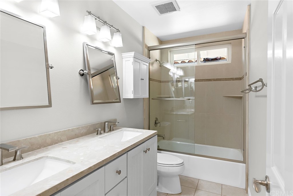 34 New Haven Laguna Niguel, CA 92677 - Photo 25 of 35 a bathroom with a granite countertop sink toilet and shower