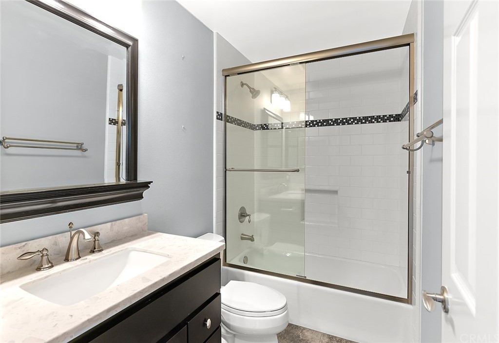 34 New Haven Laguna Niguel, CA 92677 - Photo 27 of 35 a bathroom with a granite countertop sink toilet and shower
