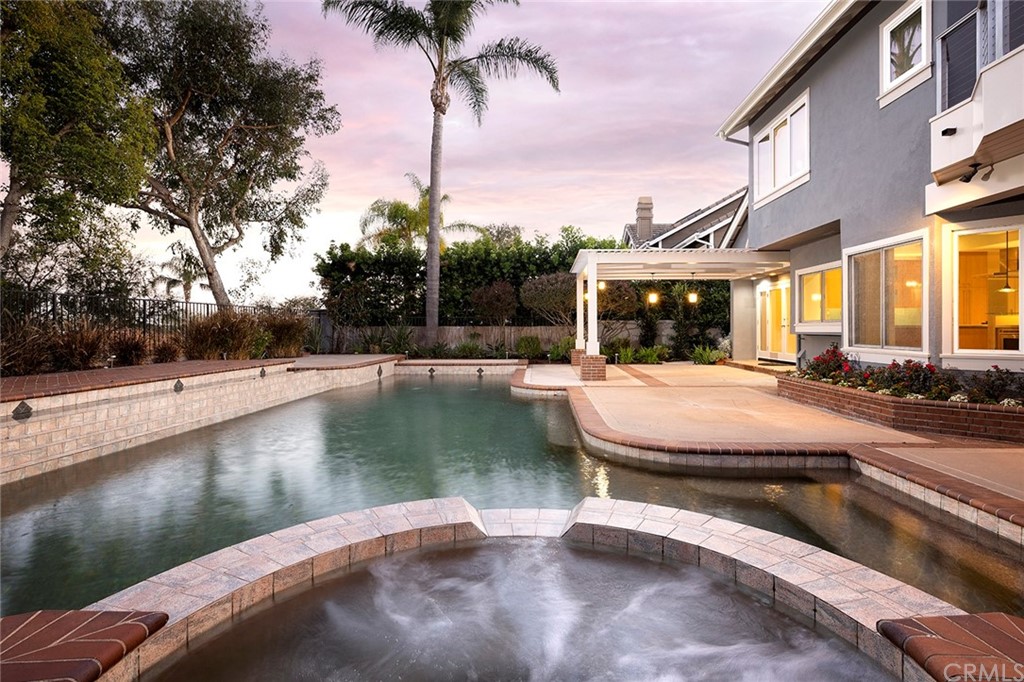 34 New Haven Laguna Niguel, CA 92677 - Photo 30 of 35 a swimming pool with outdoor seating and lake view