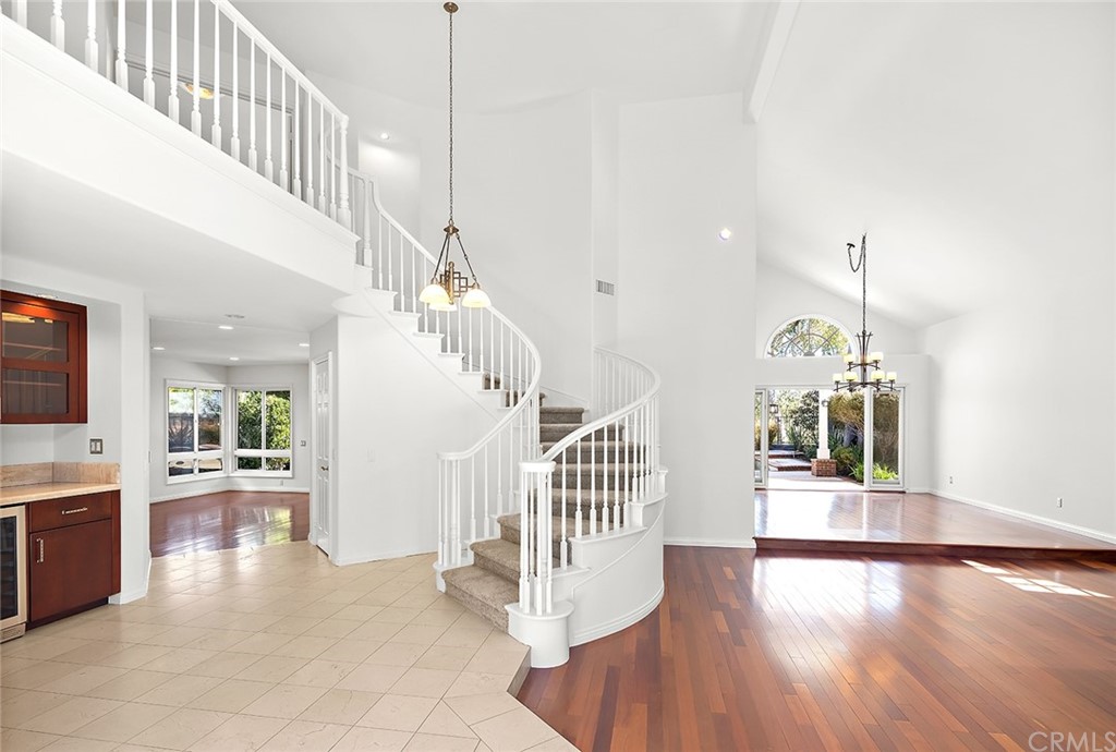 34 New Haven Laguna Niguel, CA 92677 - Photo 4 of 35 a view of a hallway with dining room and stairs