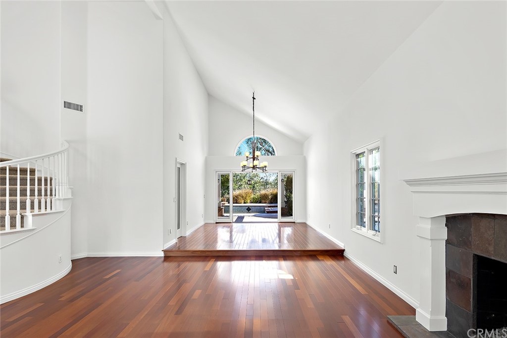 34 New Haven Laguna Niguel, CA 92677 - Photo 8 of 35 a view of a living room with a chandelier and wooden floor
