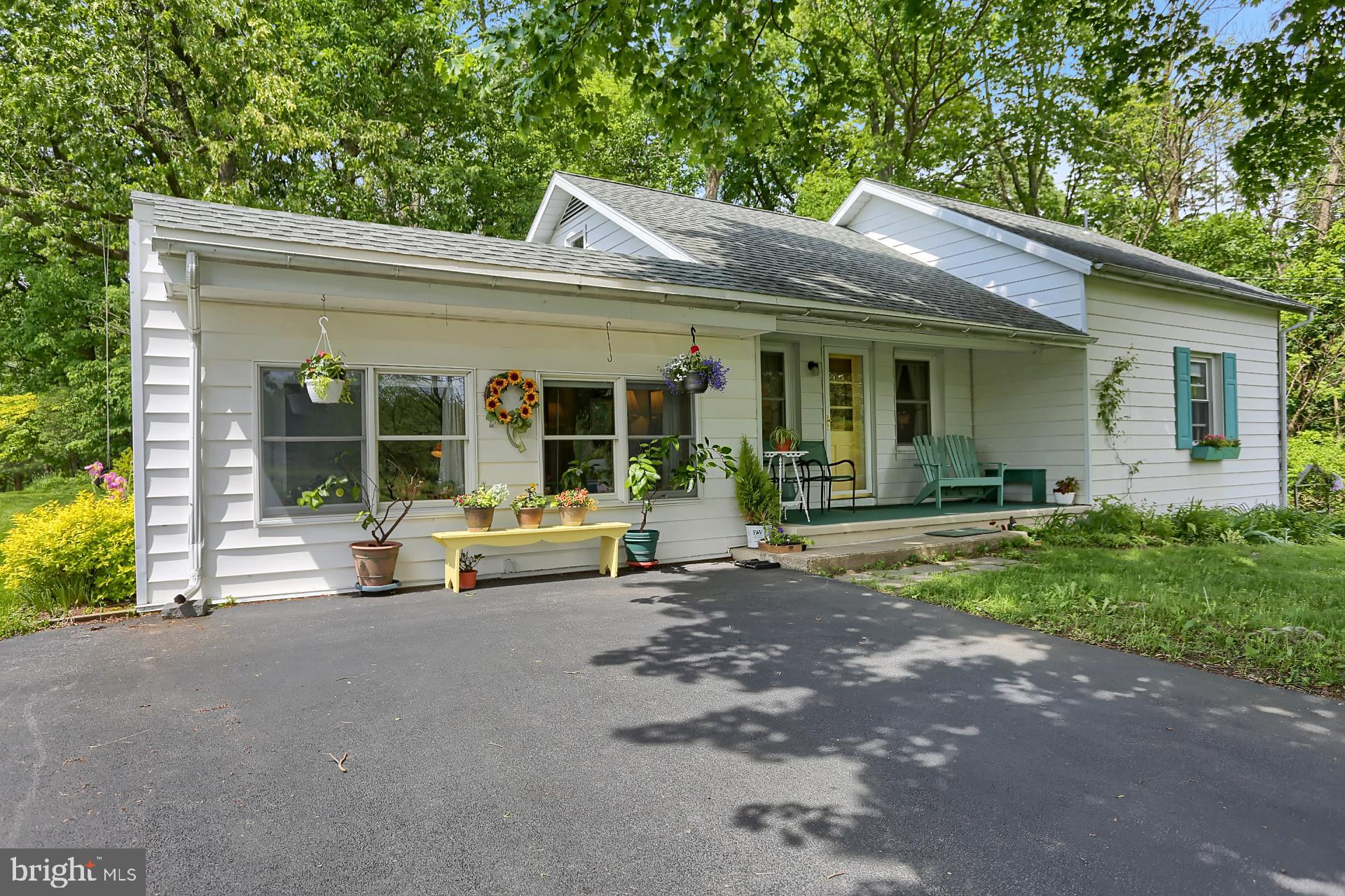 Front of house and 6 car driveway