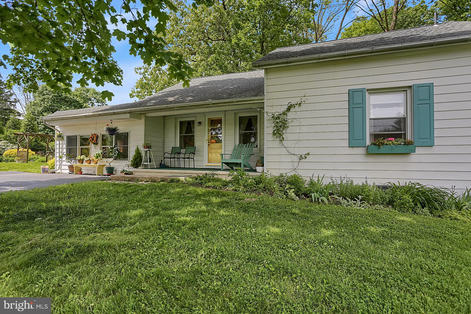 Front of house standing in front yard
