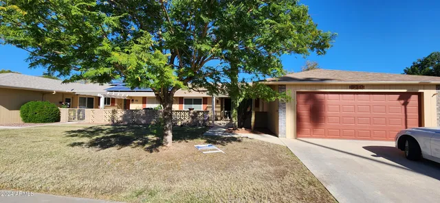 front view of a house with a patio
