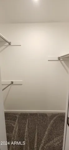 a bathroom with a sink toilet and mirror