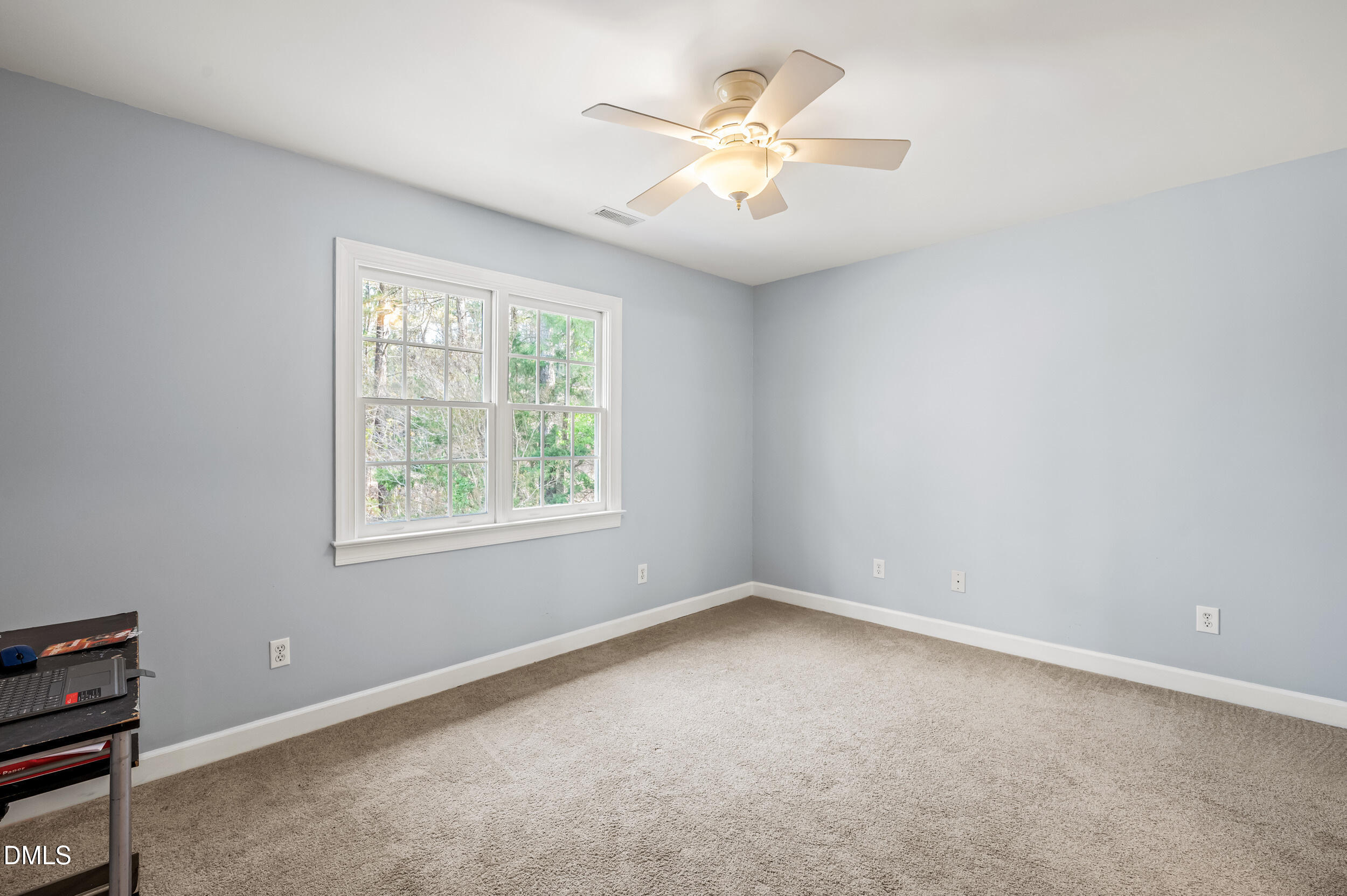 1957 Hilltop Road Raleigh, NC 27610 - Photo 21 of 46 an empty room with a window