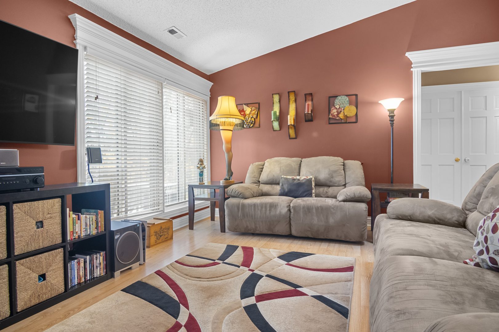 1258 Chalet Road, Unit 301 Naperville, IL 60563 - Photo 3 of 15 a living room with furniture and a flat screen tv