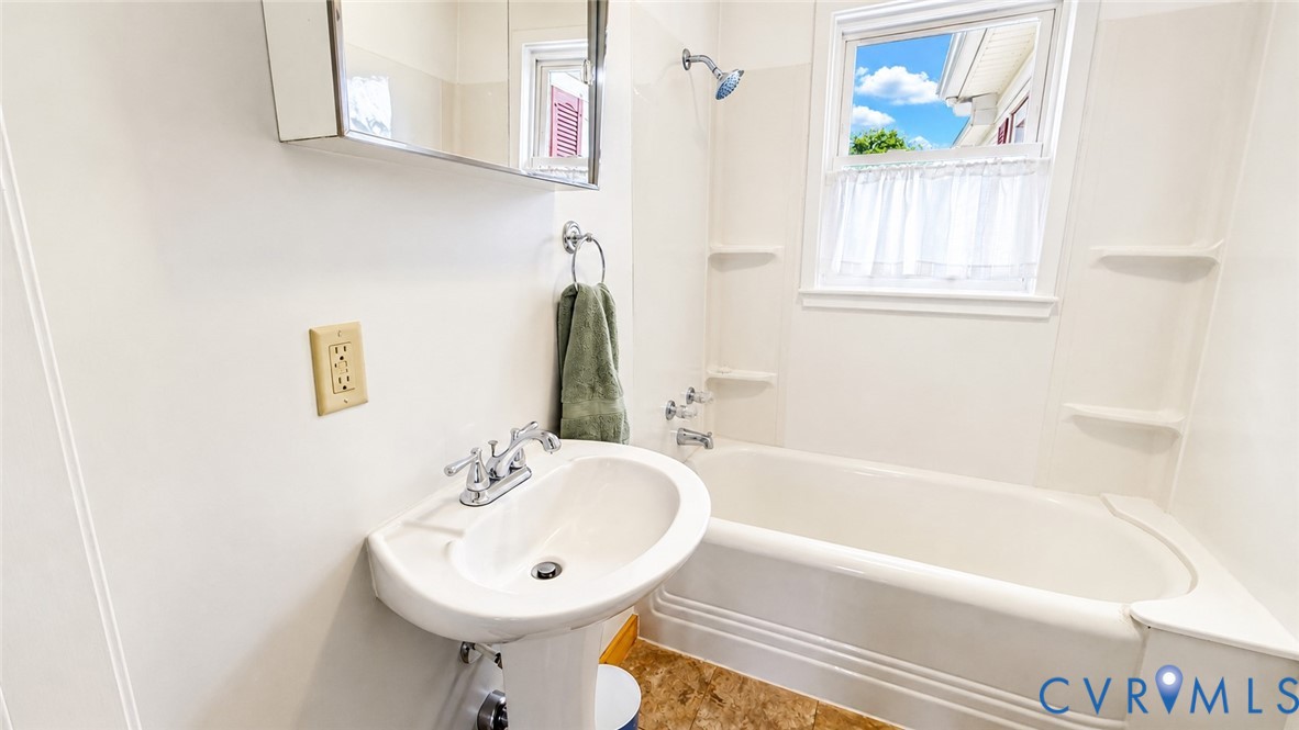 5560 West Hoover Road Reva, VA 22735 - Photo 29 of 32 White pedestal sink with chrome faucet, medicine c