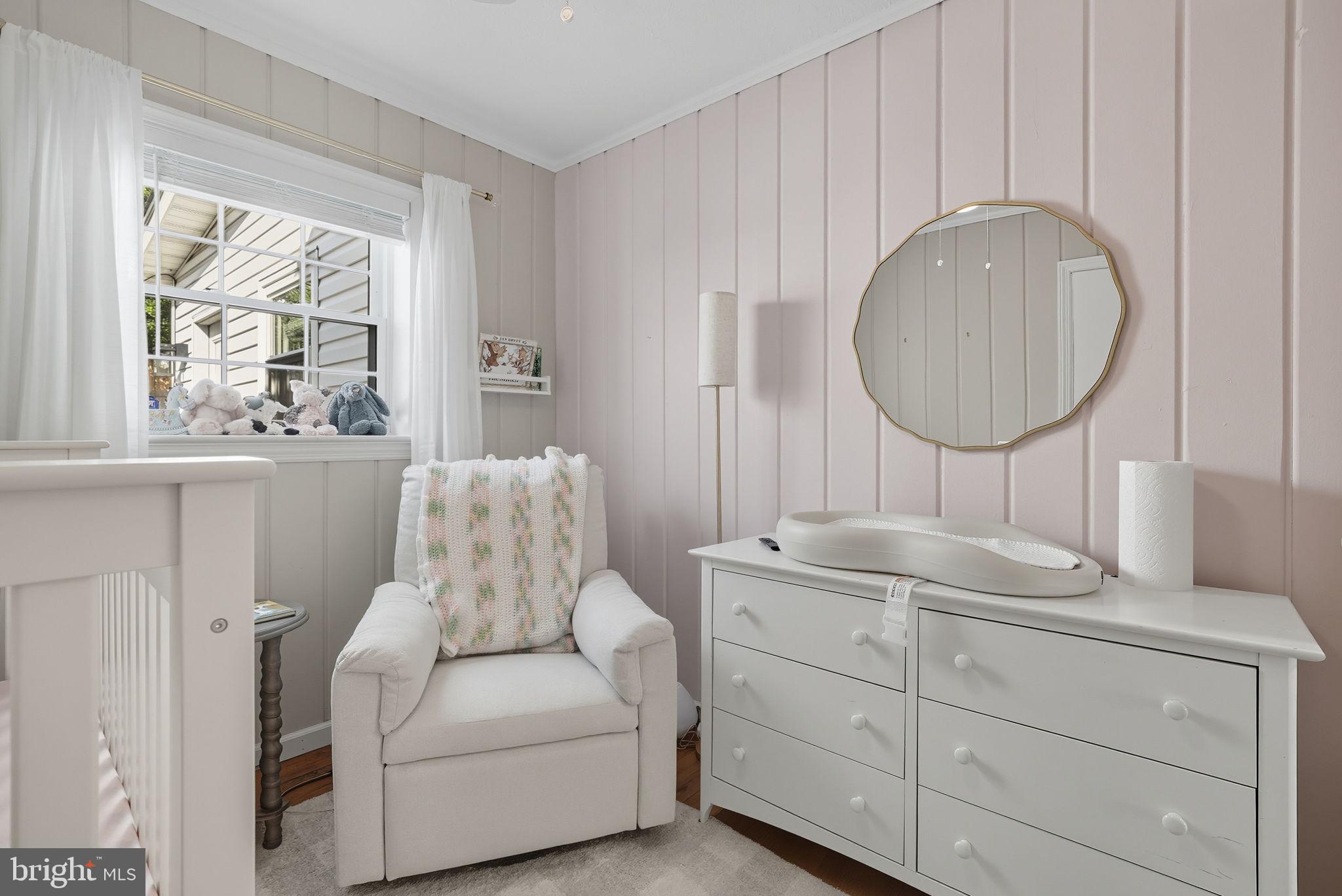 2632 North Sycamore Street Arlington, VA 22207 - Photo 15 of 26 a living room with furniture and a window