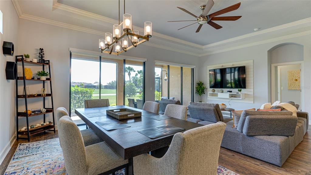 4511 Terrazza Court Lakewood Ranch, FL 34211 - Photo 7 of 65 a view of a dining room with furniture window and outside view