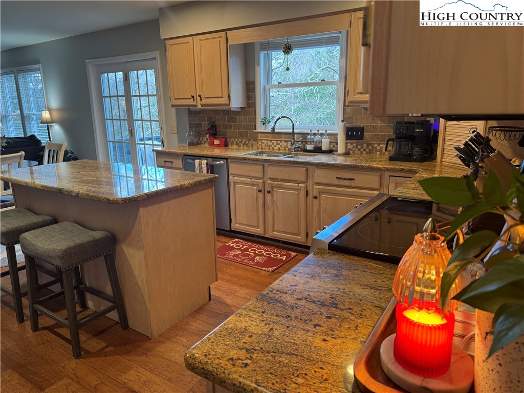 387 Tarry Acres Circle Blowing Rock, NC 28605 - Photo 12 of 41 a kitchen with a sink appliances and cabinets