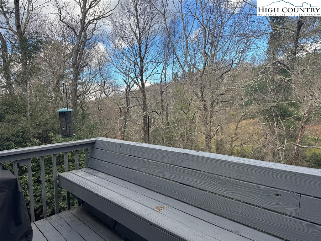387 Tarry Acres Circle Blowing Rock, NC 28605 - Photo 18 of 41 a view of backyard with wooden floor and fence