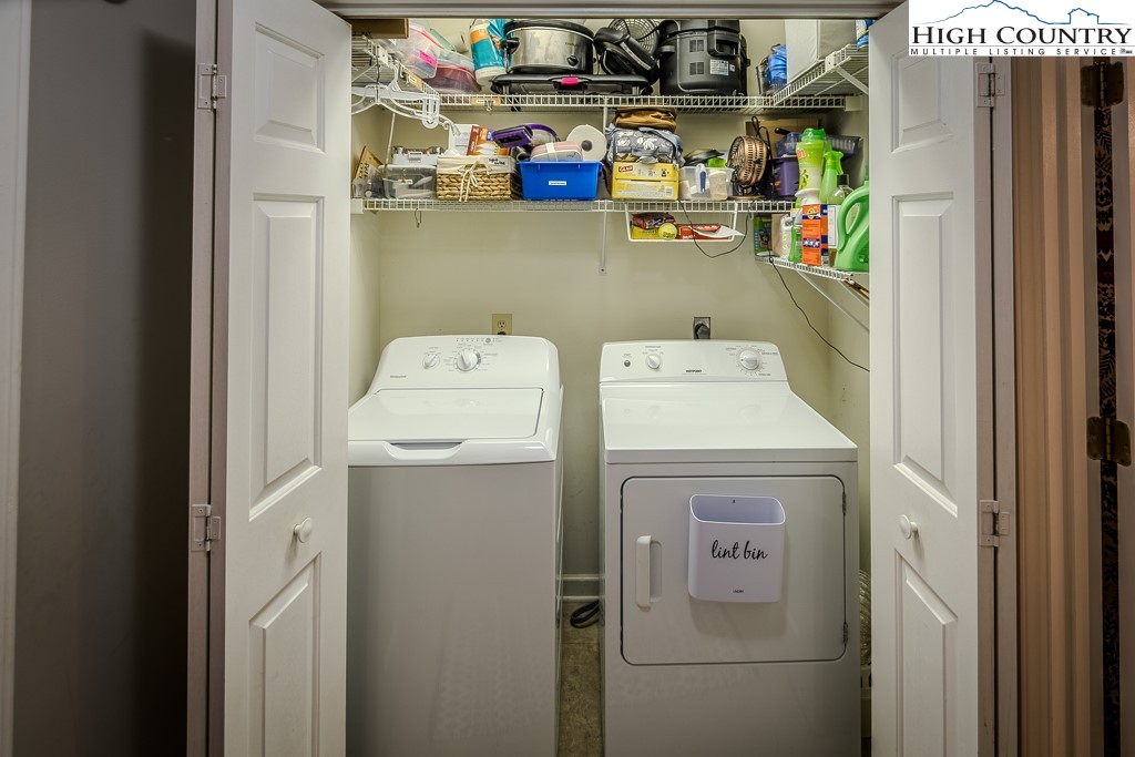 387 Tarry Acres Circle Blowing Rock, NC 28605 - Photo 19 of 41 a utility room with dryer and washer