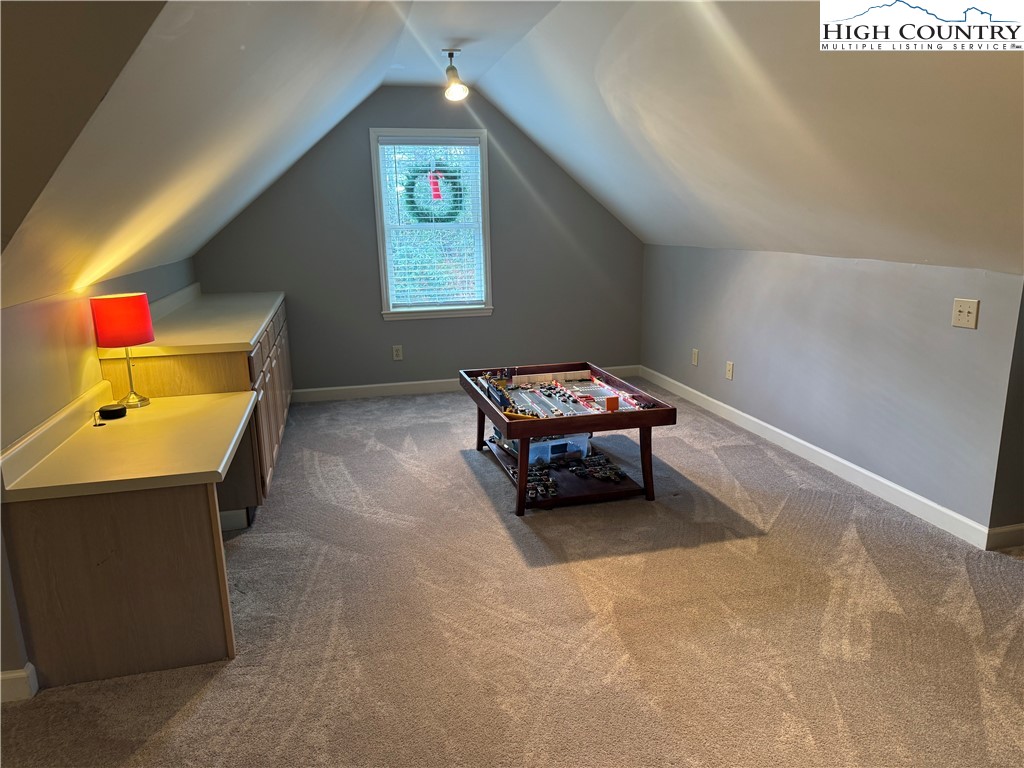 387 Tarry Acres Circle Blowing Rock, NC 28605 - Photo 32 of 41 a room with furniture and window