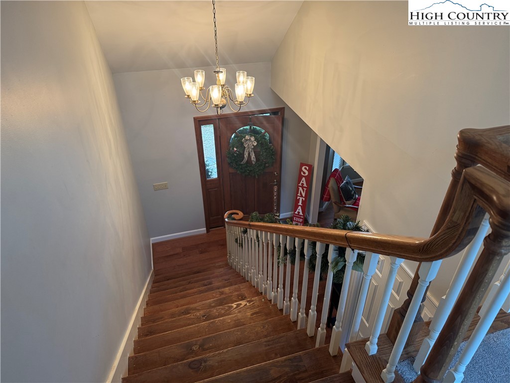 387 Tarry Acres Circle Blowing Rock, NC 28605 - Photo 34 of 41 a view of a chandelier and wooden floor