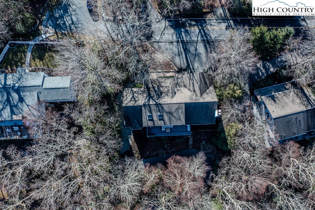 387 Tarry Acres Circle Blowing Rock, NC 28605 - Photo 40 of 41 a view of house with a yard