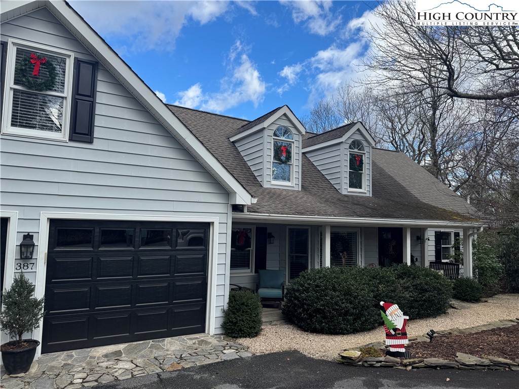 387 Tarry Acres Circle Blowing Rock, NC 28605 - Photo 5 of 41 a front view of a house with a yard