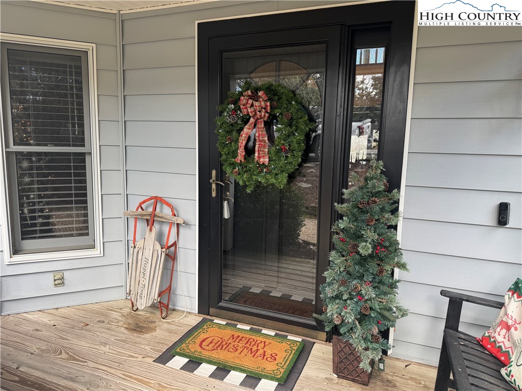 387 Tarry Acres Circle Blowing Rock, NC 28605 - Photo 6 of 41 a front view of a house with garden