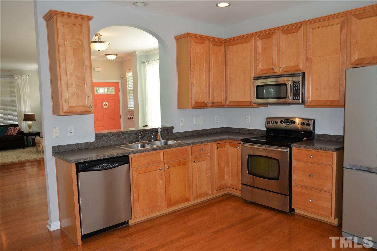 5352 Silver Moon Lane Raleigh, NC 27606 - Photo 7 of 23 Lots of cabinets, pantry, stainless appliances, Free Fridge