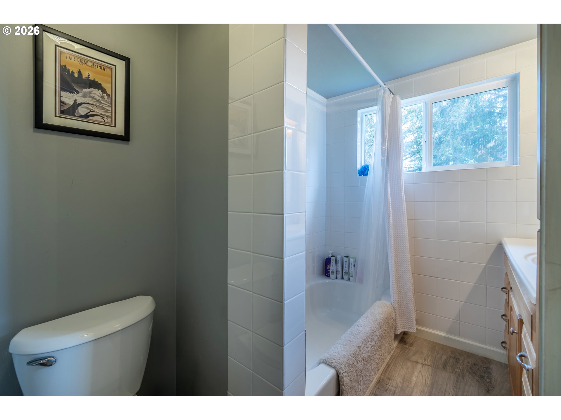42528 Hensley Hill Road Port Orford, OR 97465 - Photo 13 of 37 a bathroom with a toilet sink and tub