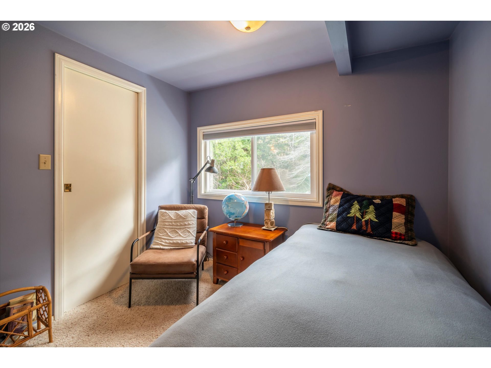 42528 Hensley Hill Road Port Orford, OR 97465 - Photo 15 of 37 a bedroom with furniture and a large window