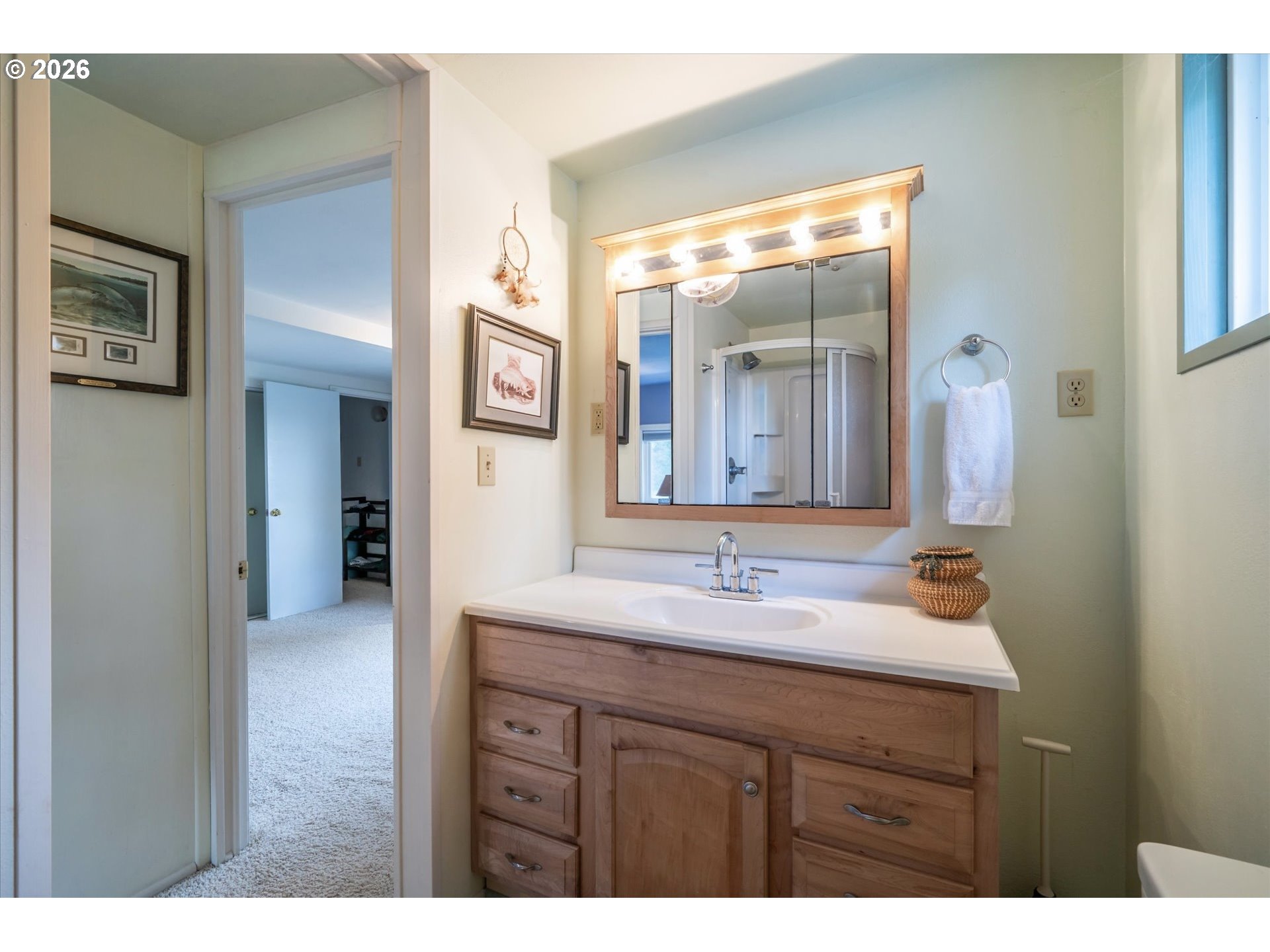 42528 Hensley Hill Road Port Orford, OR 97465 - Photo 17 of 37 a bathroom with a sink and a mirror