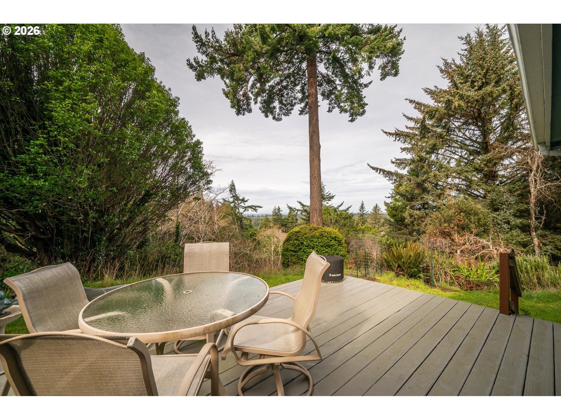 42528 Hensley Hill Road Port Orford, OR 97465 - Photo 21 of 37 a balcony with table and chairs