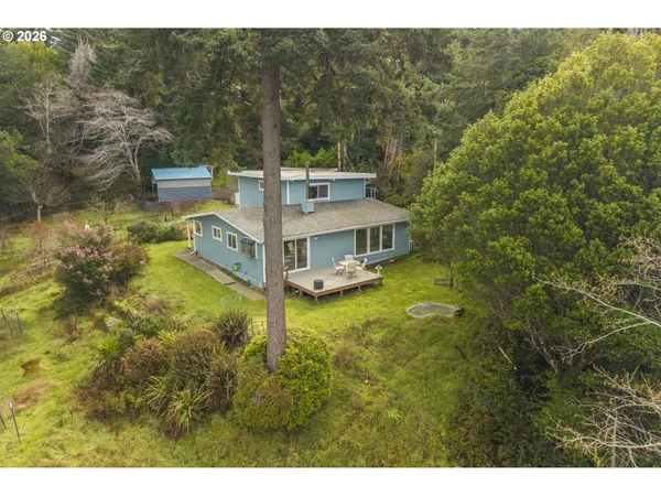 a view of a house with a big yard