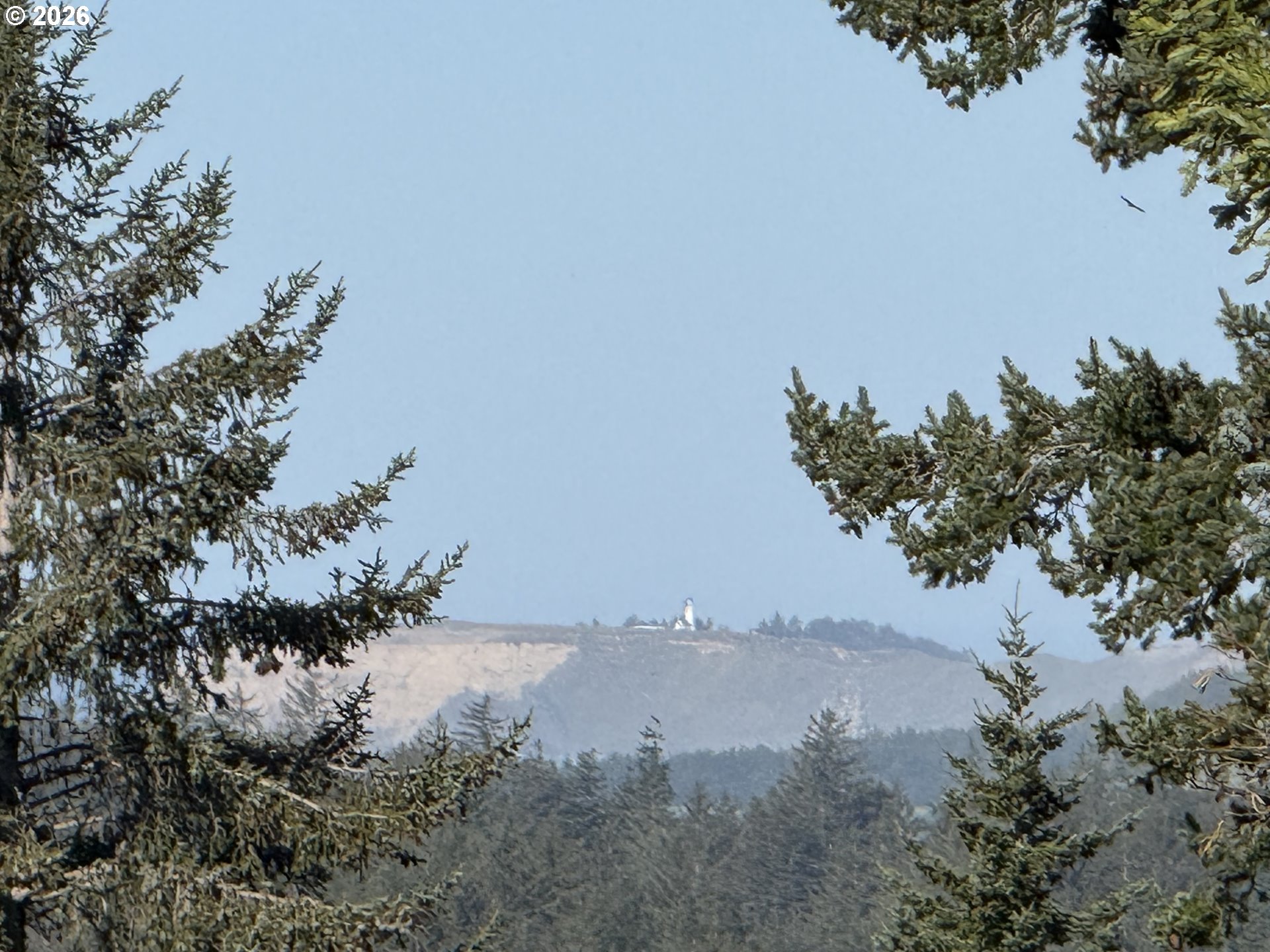 42528 Hensley Hill Road Port Orford, OR 97465 - Photo 29 of 37 a view of a lake and mountain in the back