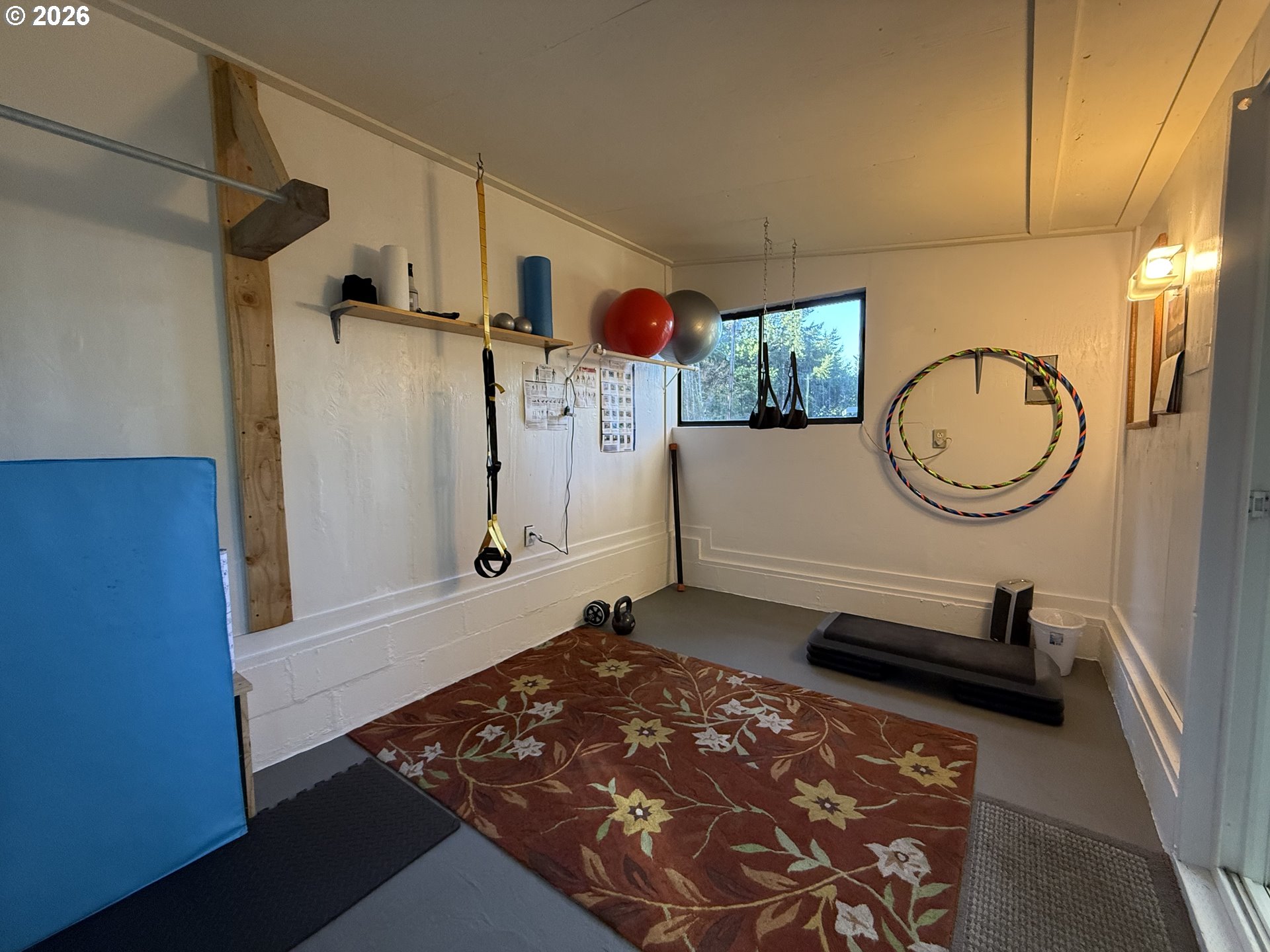 42528 Hensley Hill Road Port Orford, OR 97465 - Photo 31 of 37 a view of a room with racks on the wall