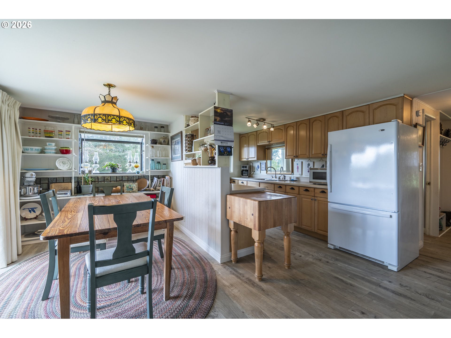 42528 Hensley Hill Road Port Orford, OR 97465 - Photo 9 of 37 a kitchen with a table and chairs in it