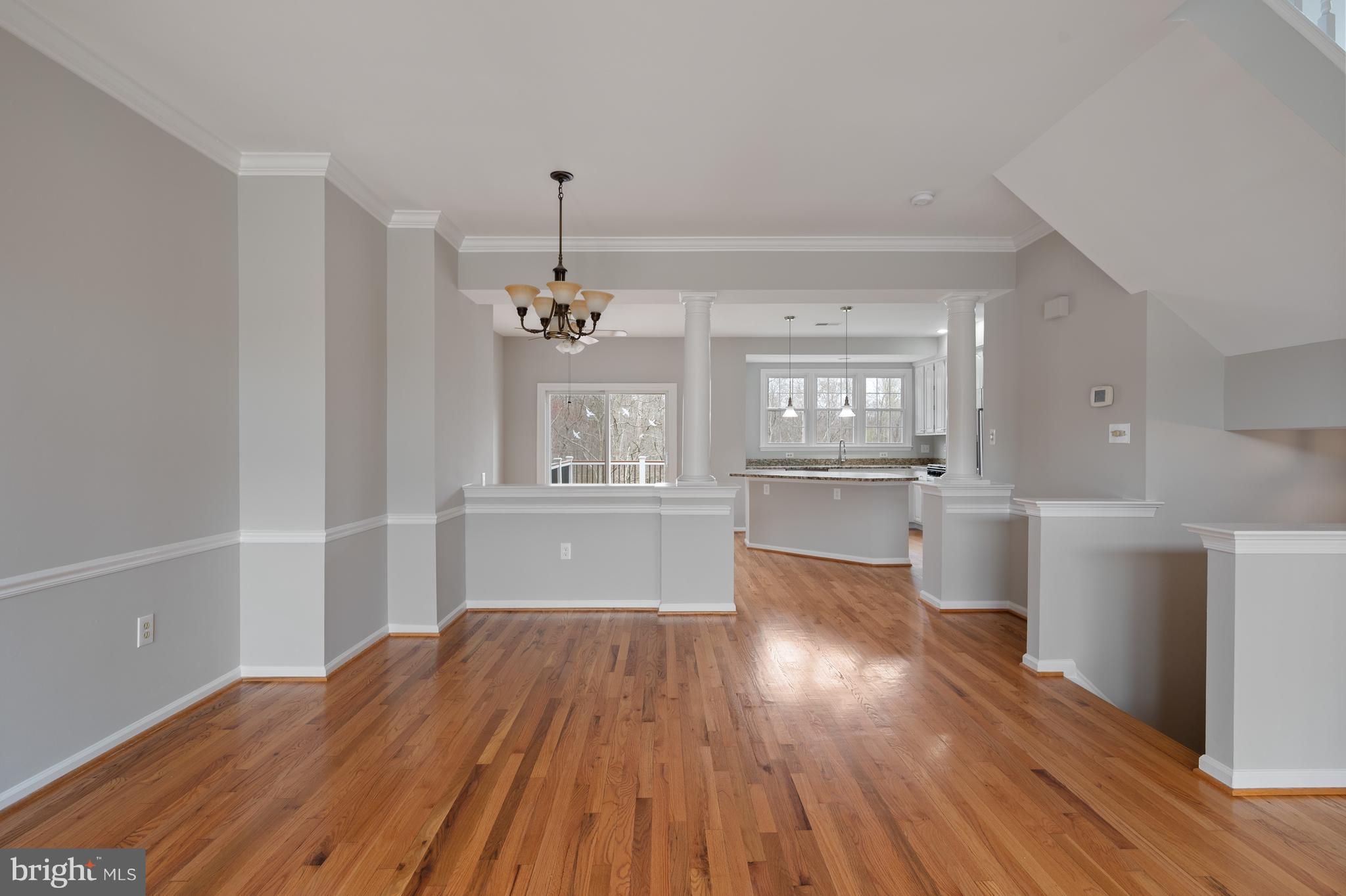 20334 Burnley Square Sterling, VA 20165 - Photo 13 of 57 a view of a kitchen with wooden floor and a kitchen