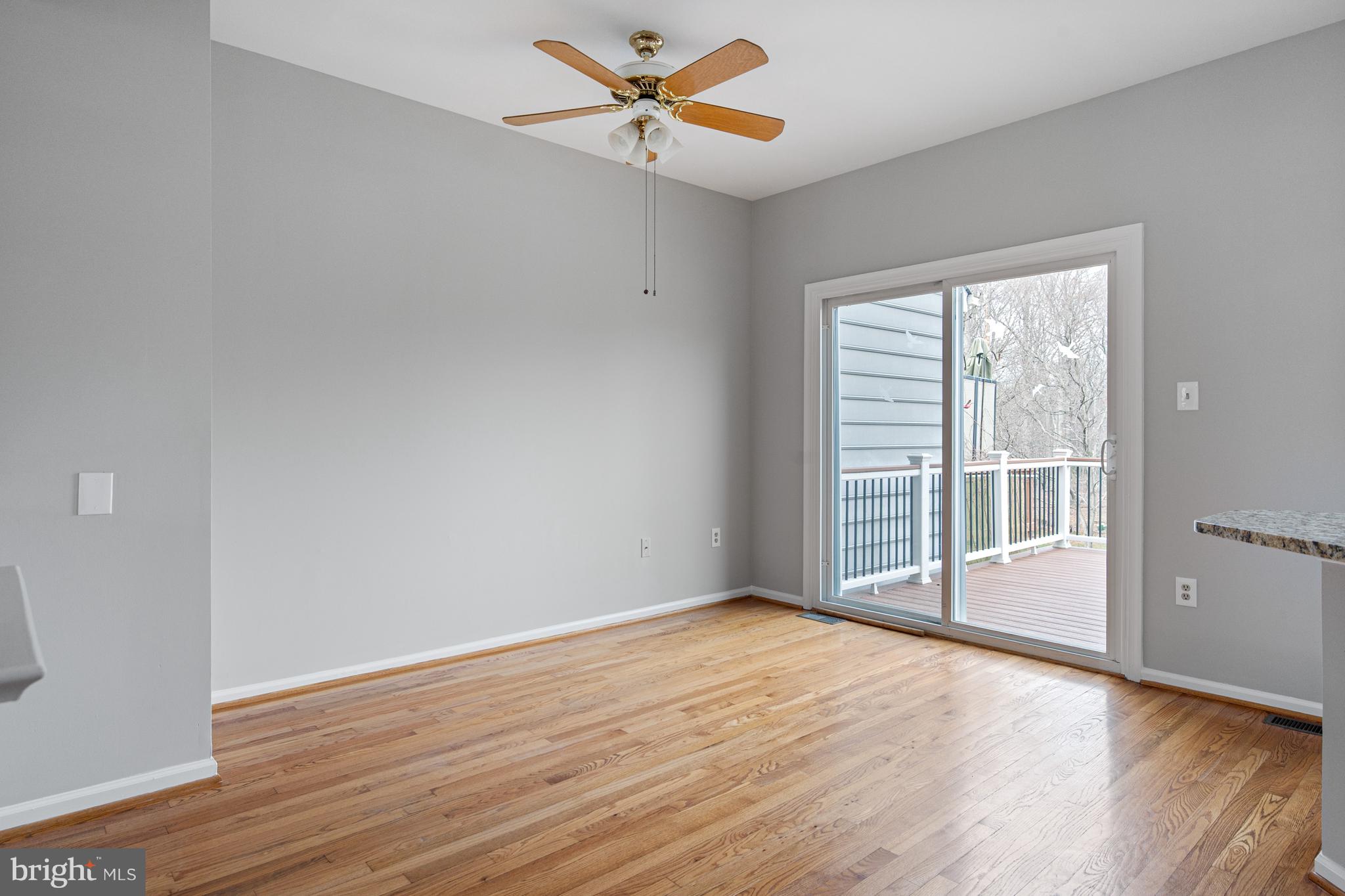 20334 Burnley Square Sterling, VA 20165 - Photo 19 of 57 wooden floor in an empty room with a window
