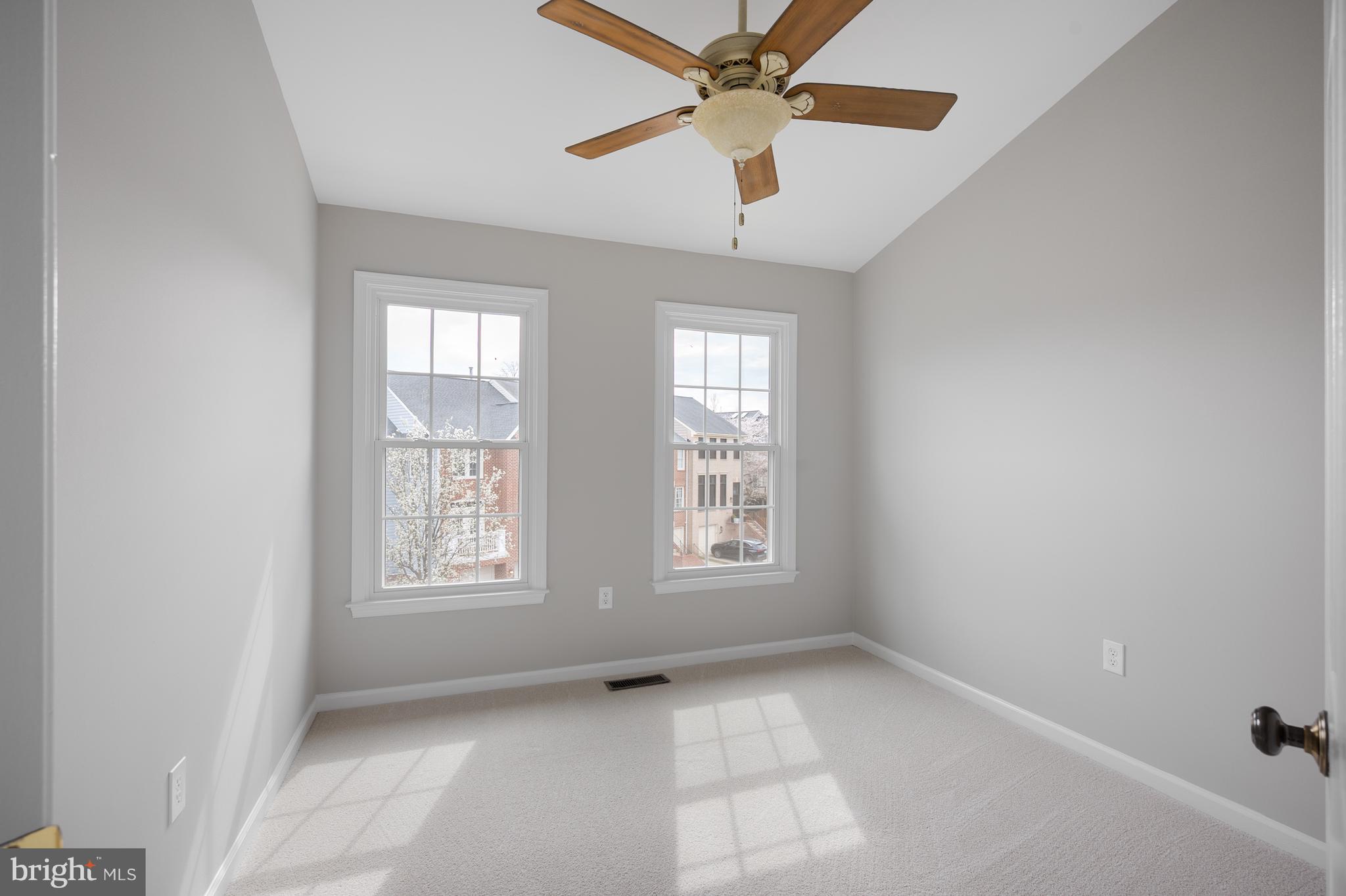 20334 Burnley Square Sterling, VA 20165 - Photo 33 of 57 an empty room with windows and fan