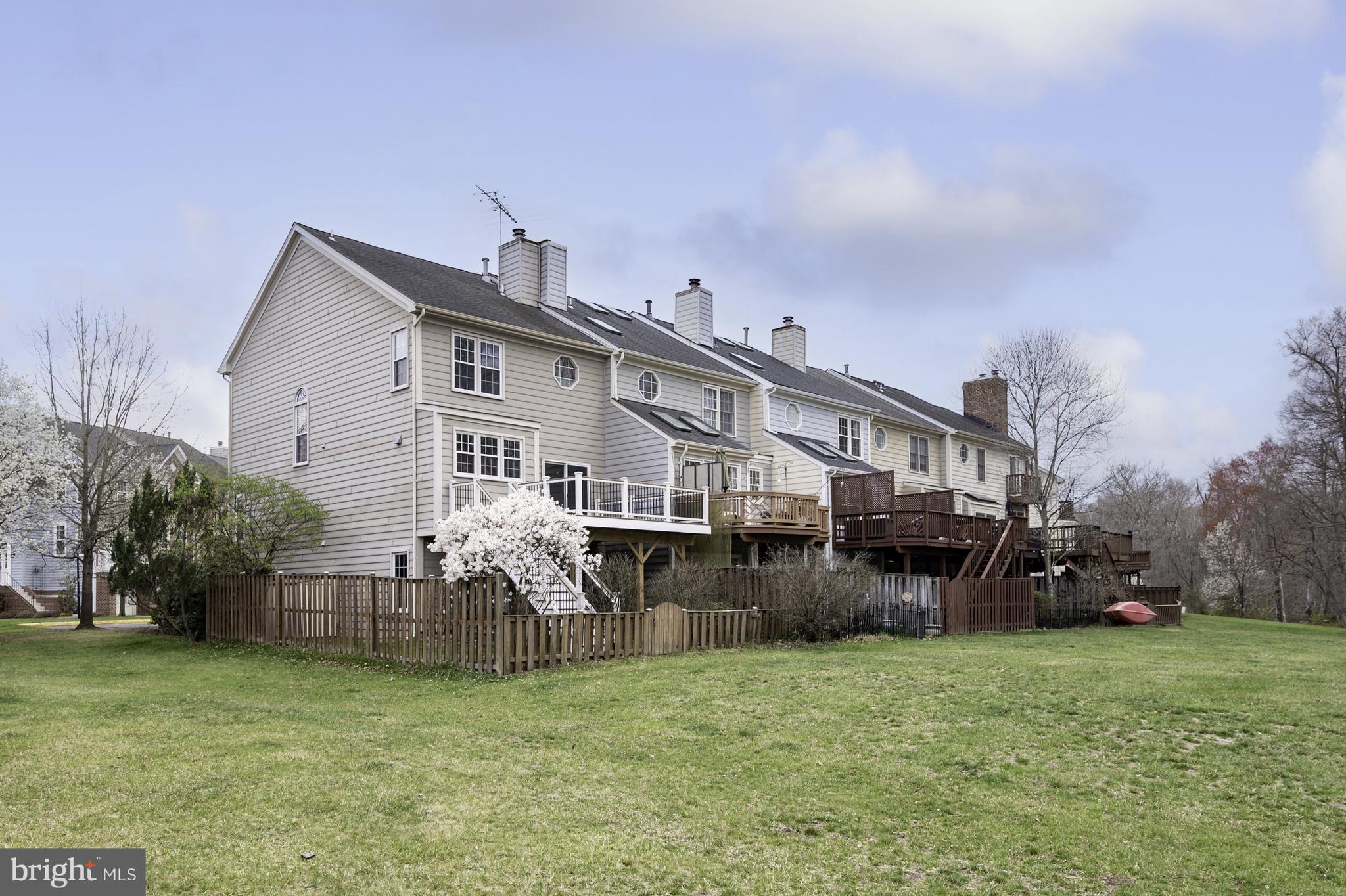 20334 Burnley Square Sterling, VA 20165 - Photo 46 of 57 a view of a house with a yard