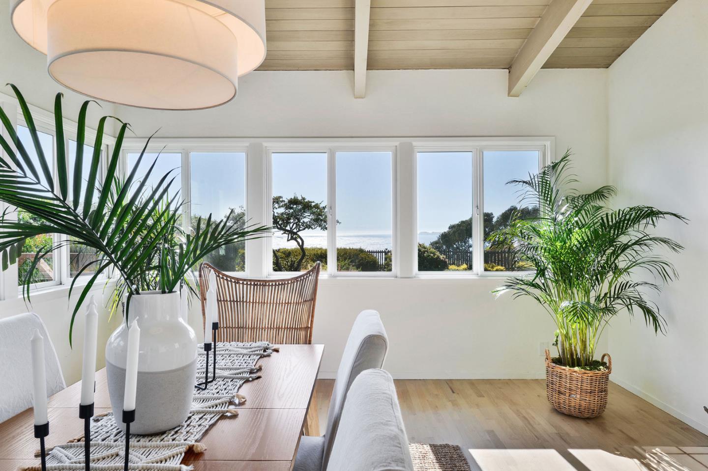 532 Bayview Drive Aptos, CA 95003 - Photo 14 of 47 a vase of flowers sitting on a table in front of a house