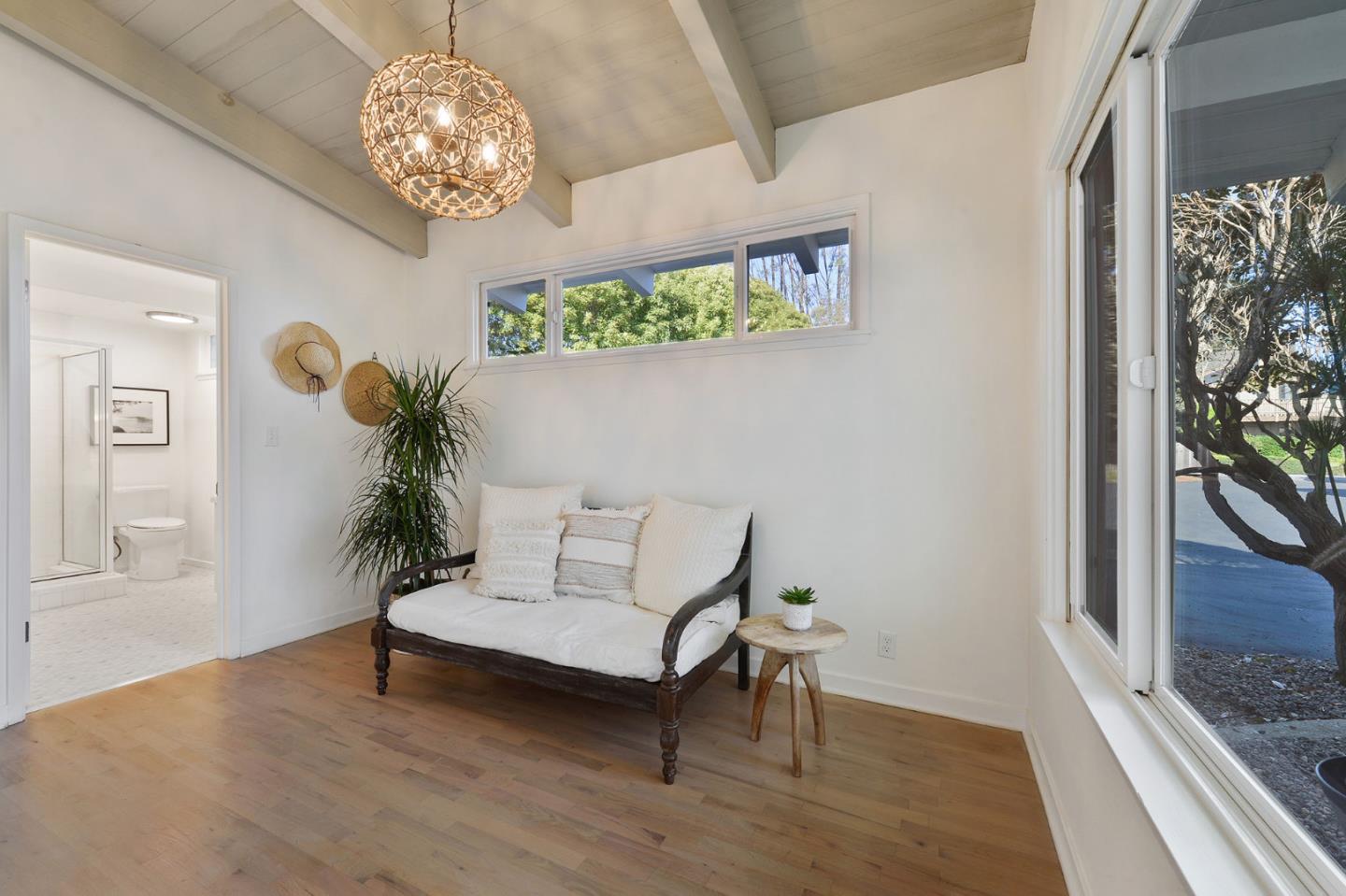 532 Bayview Drive Aptos, CA 95003 - Photo 23 of 47 a living room with furniture and a chandelier