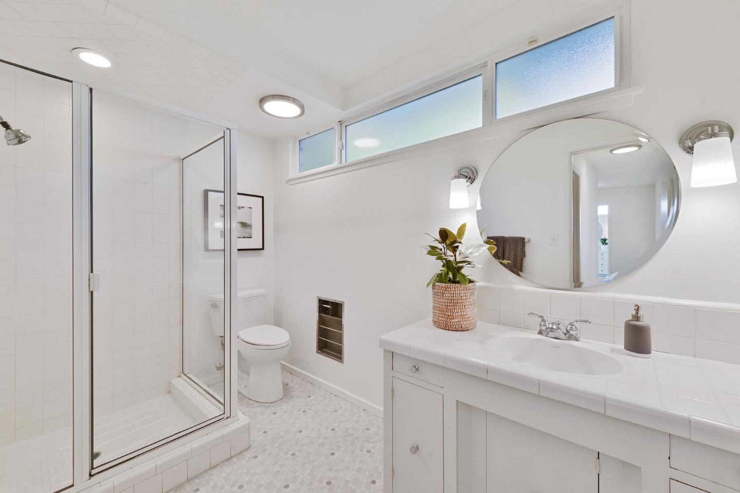 532 Bayview Drive Aptos, CA 95003 - Photo 24 of 47 a bathroom with a toilet sink and shower