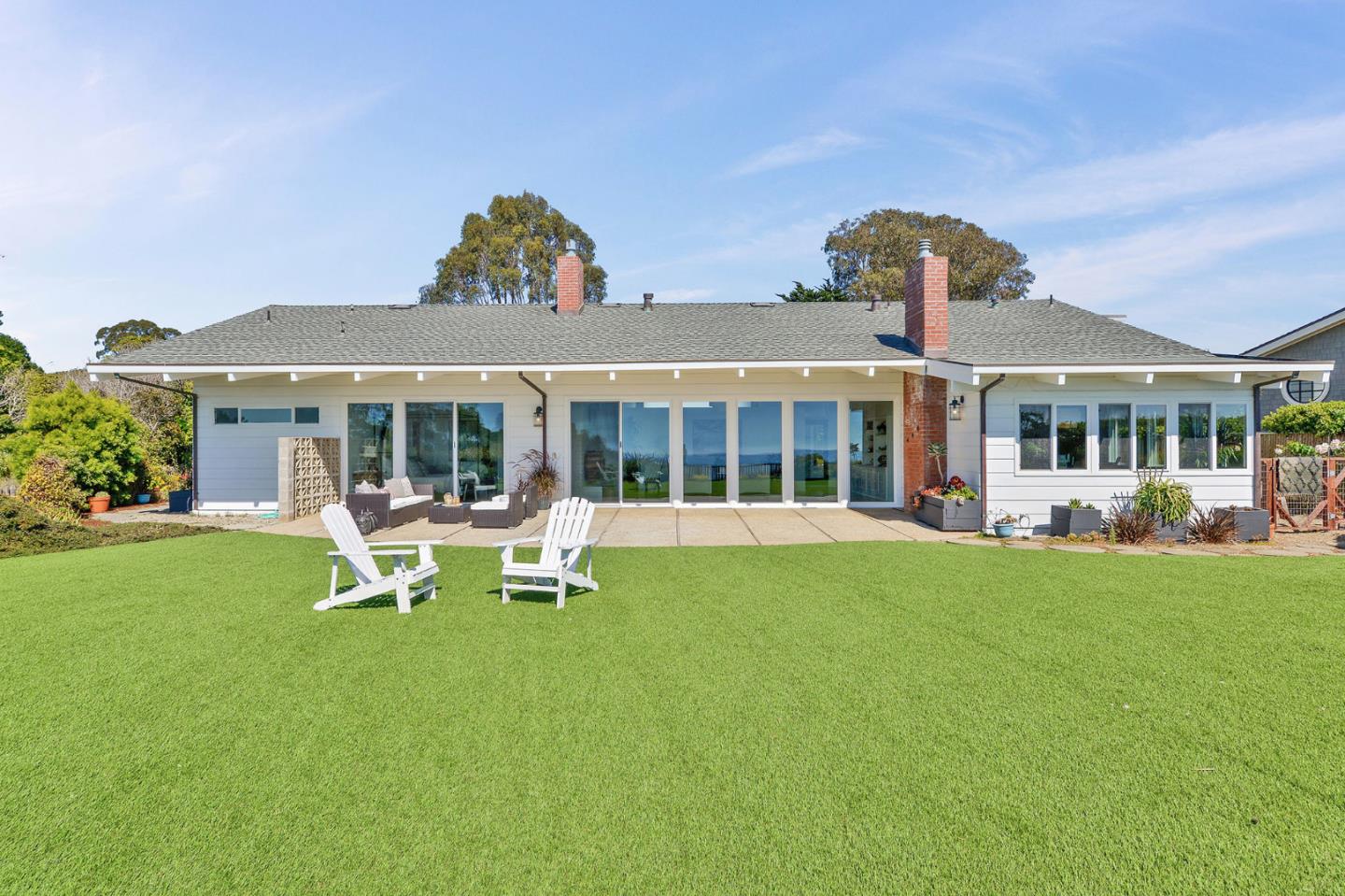 532 Bayview Drive Aptos, CA 95003 - Photo 33 of 47 a view of a house with backyard porch and sitting area
