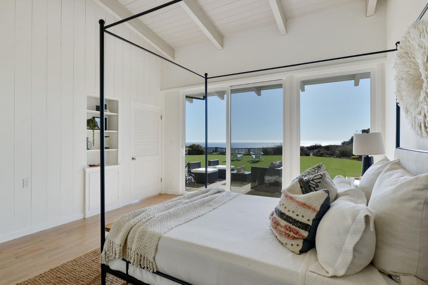 532 Bayview Drive Aptos, CA 95003 - Photo 9 of 47 a bedroom with a bed window and a lamp