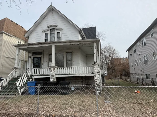 a front view of a house with a porch