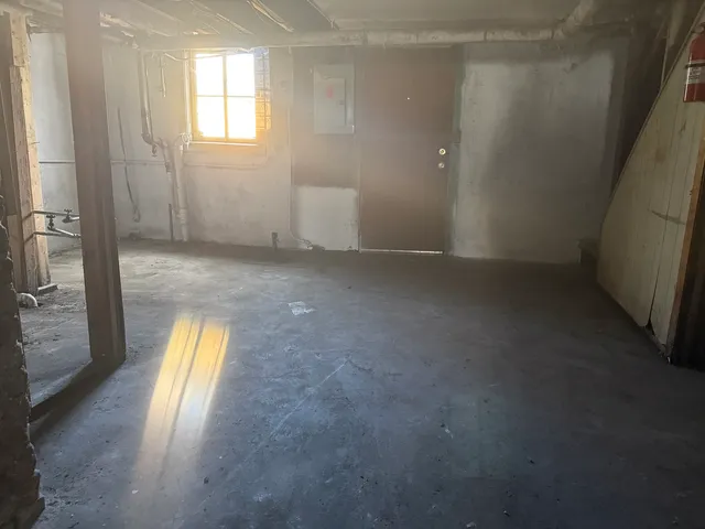 a view of empty room with windows