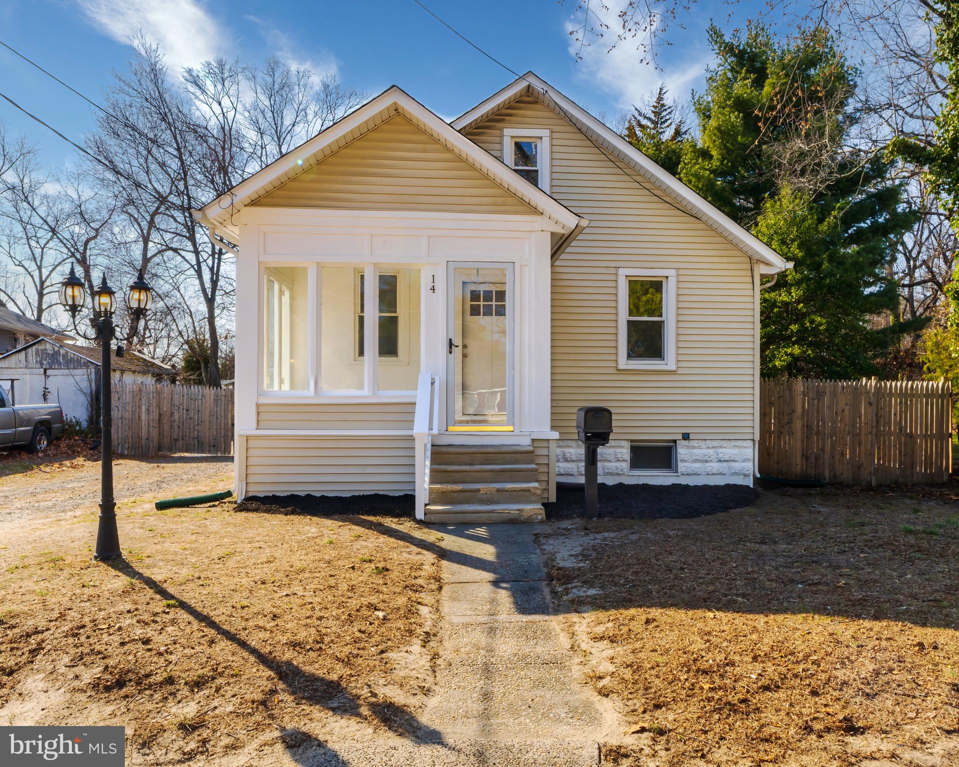 14 Forrest Avenue Clementon, NJ 08021 - Photo 1 of 20 a front view of a house with a yard