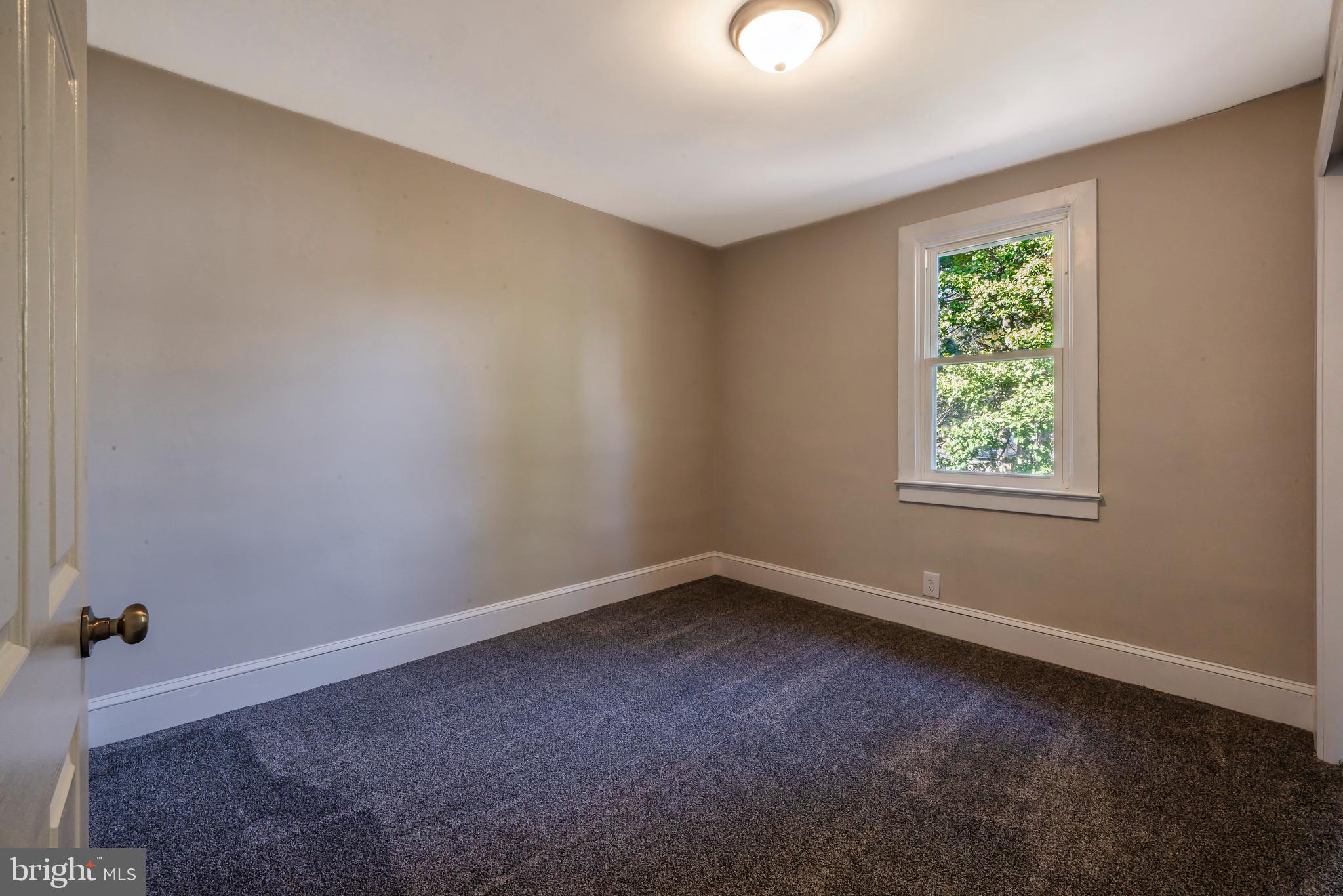 14 Forrest Avenue Clementon, NJ 08021 - Photo 14 of 20 an empty room with a window