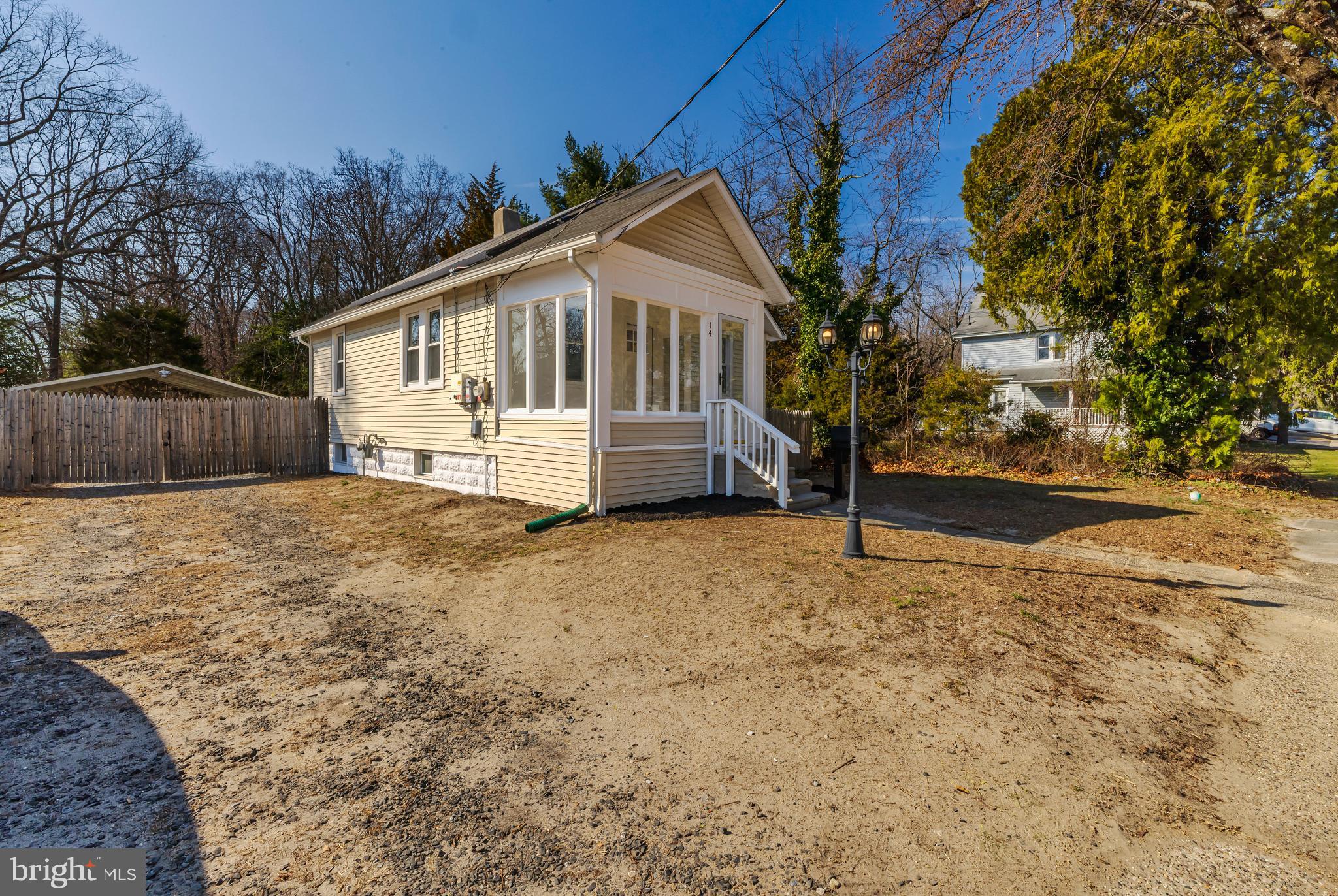 14 Forrest Avenue Clementon, NJ 08021 - Photo 2 of 20 a house with trees in front of it
